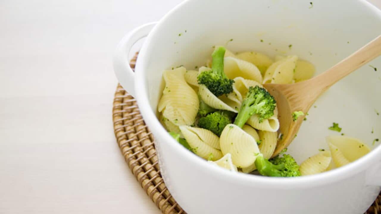 Creamy pasta sauce with smoked chicken and broccoli